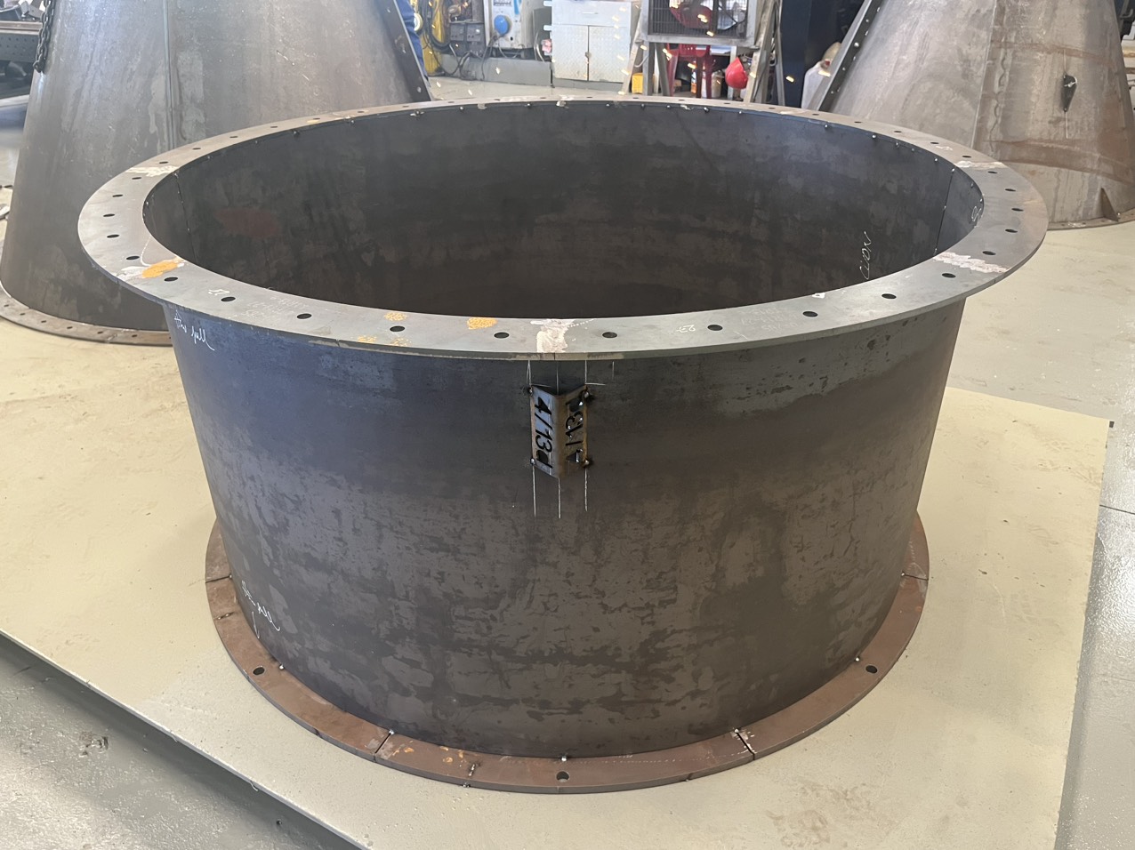 Welded fabrication part