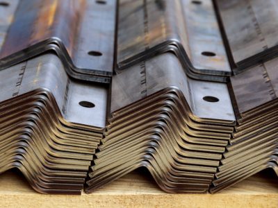 A stack of sheet metal products after processing on a bending machine.